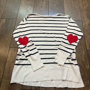 Marled black and white striped sweater with hearts on elbows